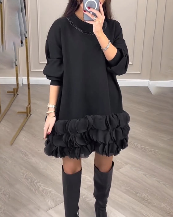 Elegant kjole i kronblade-design