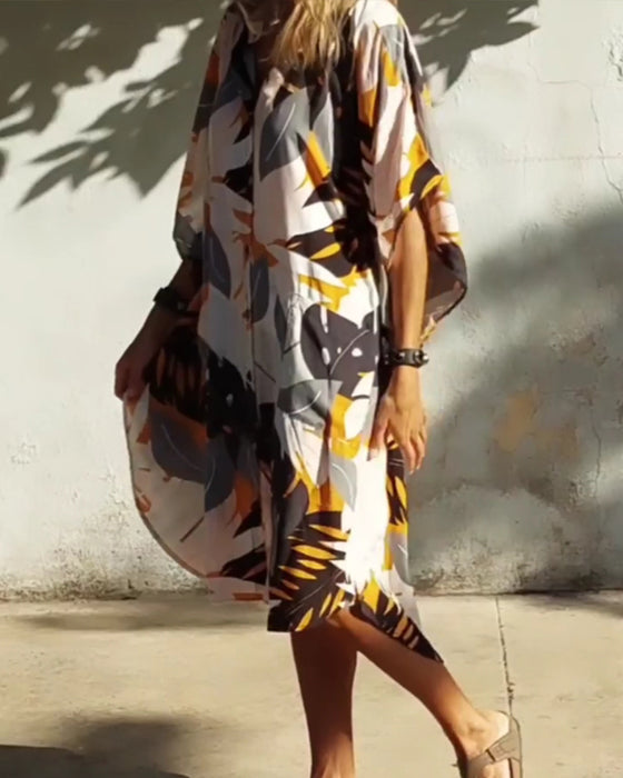 Kjole med lommer og bladprint