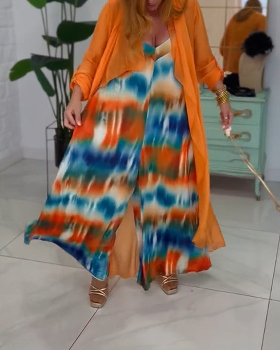 To-delt sæt | Farverigt jumpsuit og orange cardigan