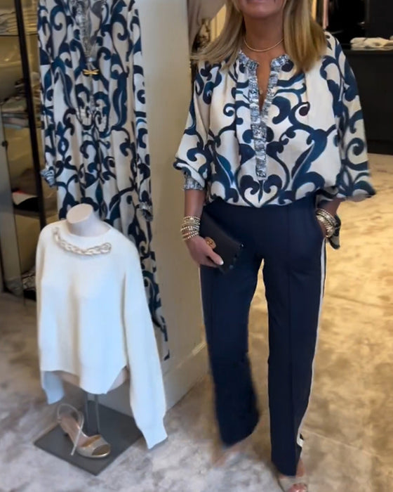 Bluse med lanterneærmer og retromønster