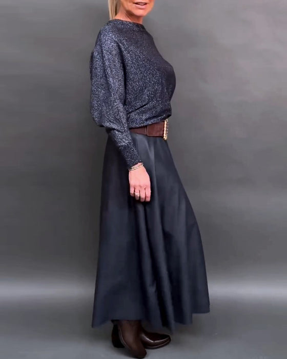 Skinnende top med rund hals og dolmanærmer