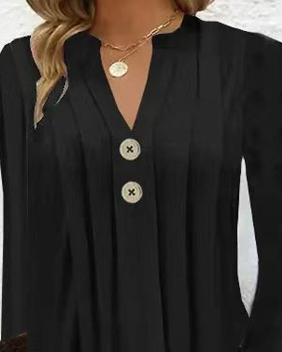 Sort plisseret kjole med knapper