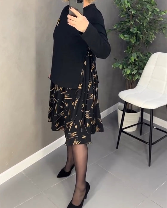 Afslappet kjole med mønstret nederdel