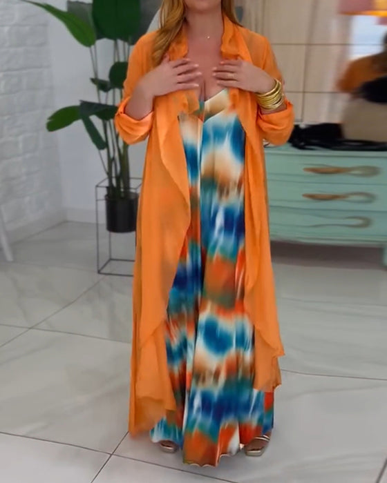 To-delt sæt | Farverigt jumpsuit og orange cardigan