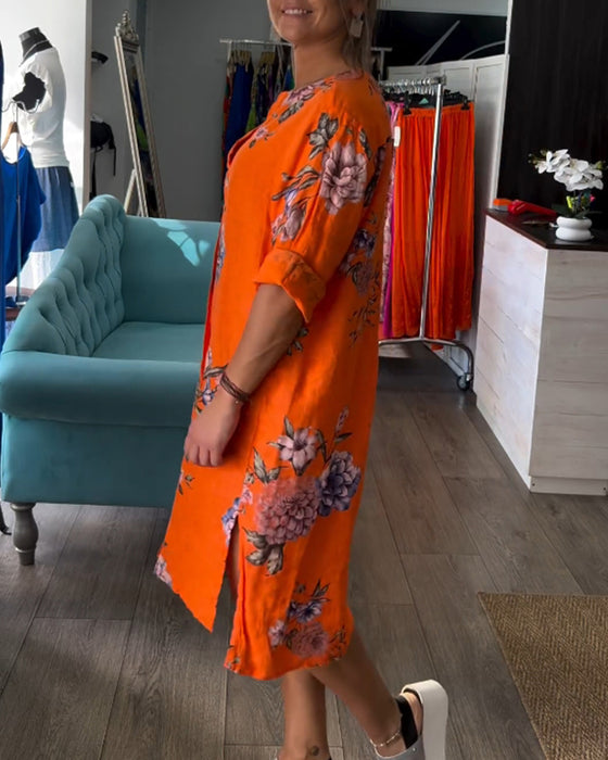 Orange kjole med knapper og print
