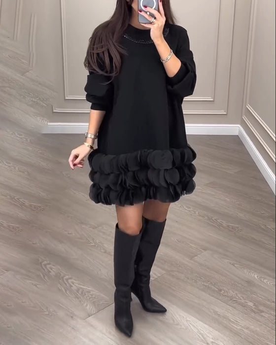 Elegant kjole i kronblade-design