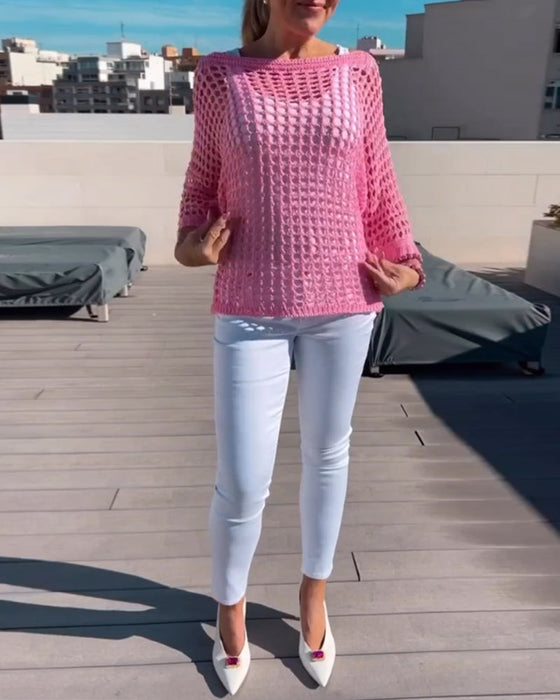 Ensfarvet top i udhulet netdesign