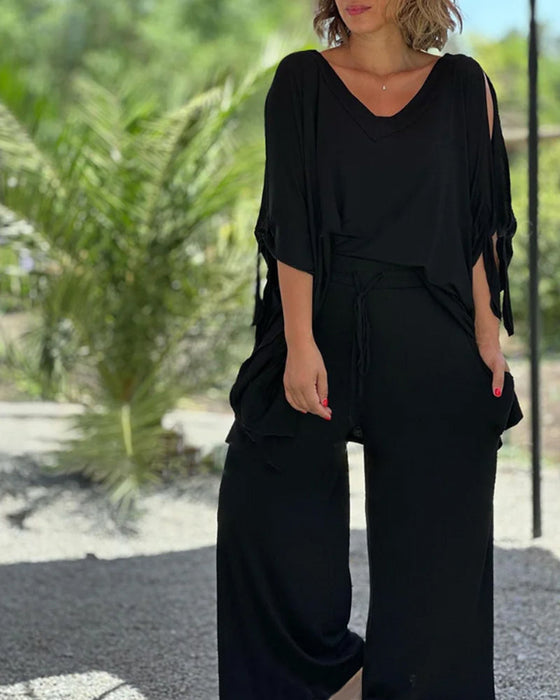 Ensfarvet todelt sæt i afslappet pasform