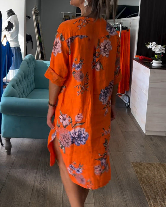 Orange kjole med knapper og print