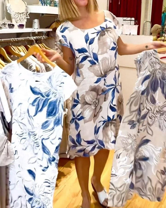 Elegant kortærmet kjole med blomsterprint