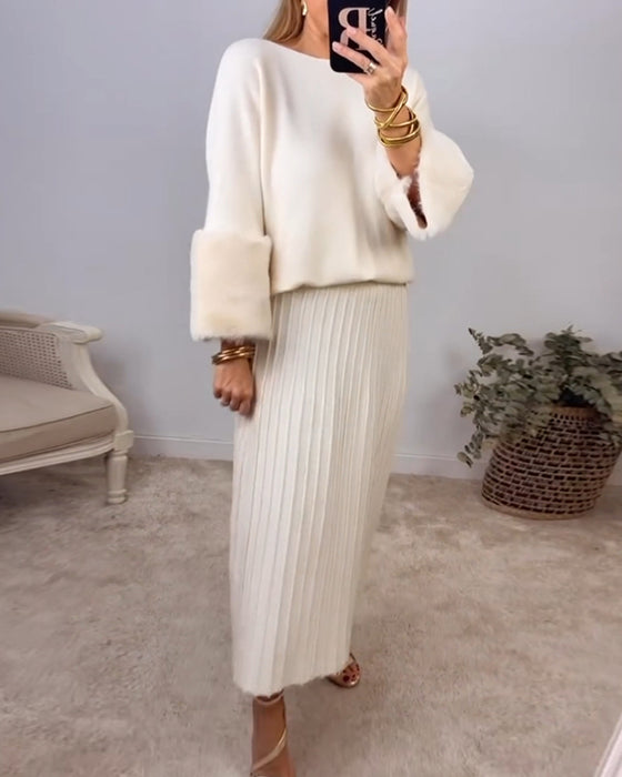 Elegant hvid sweater med plysmanchetter