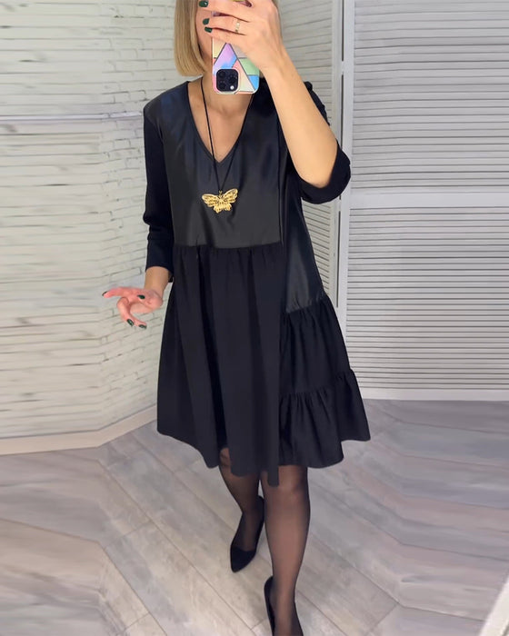 Patchwork kjole med V-hals