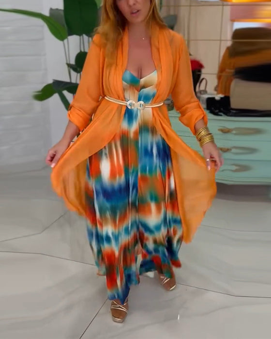 To-delt sæt | Farverigt jumpsuit og orange cardigan