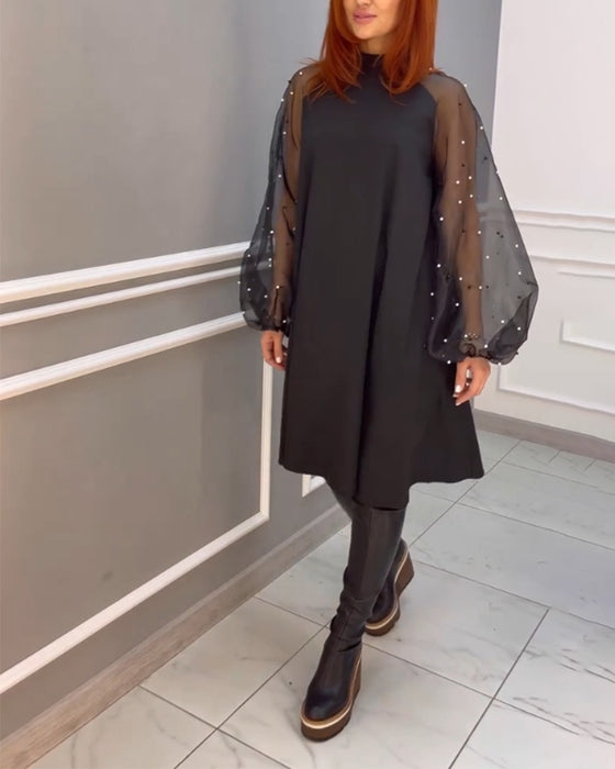 Kjole i løs pasform med mesh ærmer