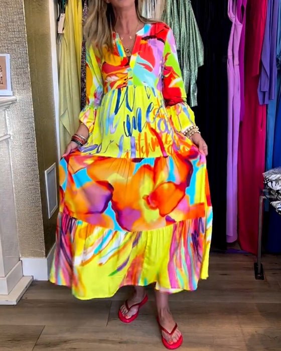 Farverig kjole med vide ærmer