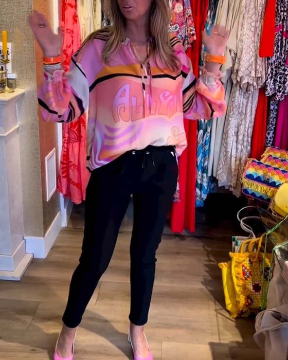 Farverig top med snøre