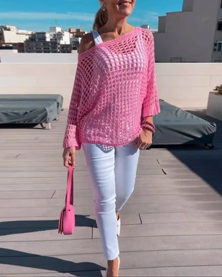 Ensfarvet top i udhulet netdesign