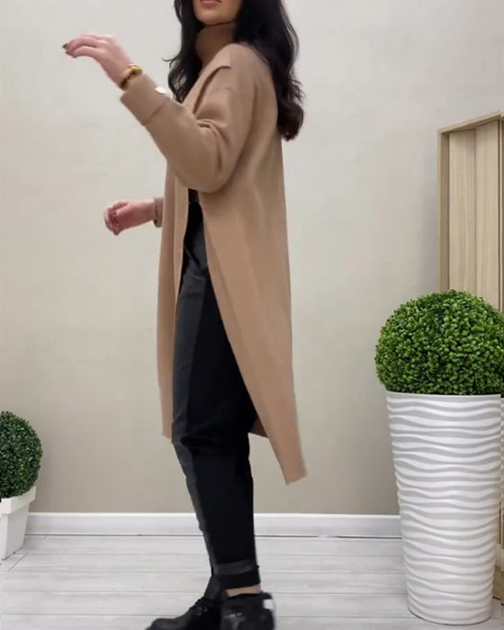 Sweaterkjole med rullekrave og sidesnit