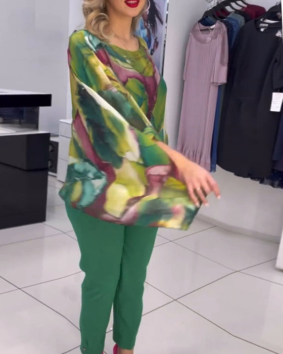 Rundhalset bluse med print og flagermusærmer