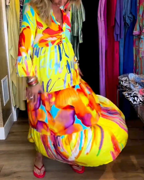 Farverig kjole med vide ærmer