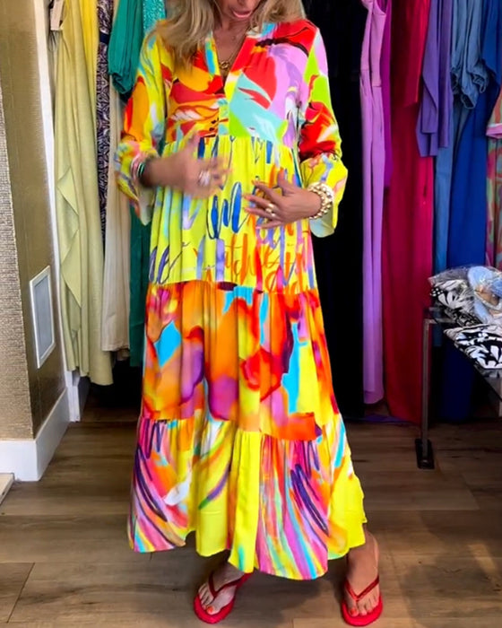 Farverig kjole med vide ærmer