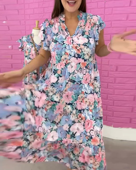 Blomsterkjole med V-hals i afslappet stil