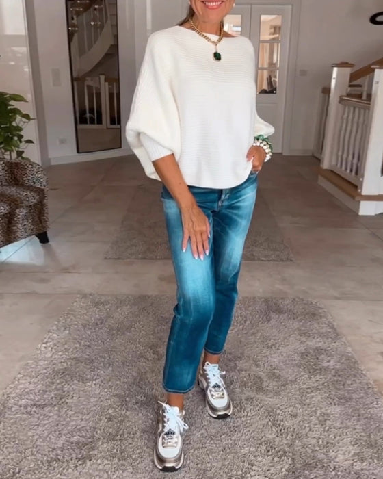 Ensfarvet sweater med lanterneærmer