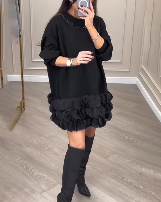 Elegant kjole i kronblade-design