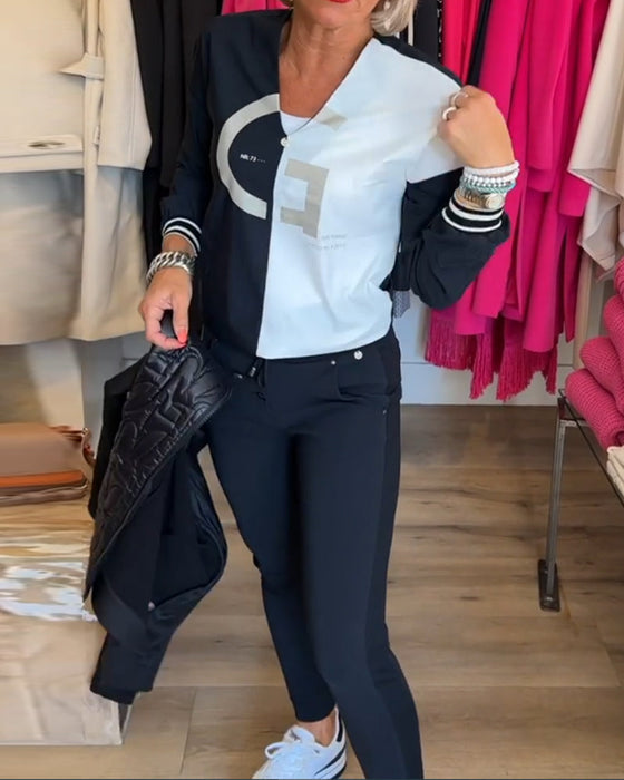 Top med V-udskæring og sort-hvid farveblok