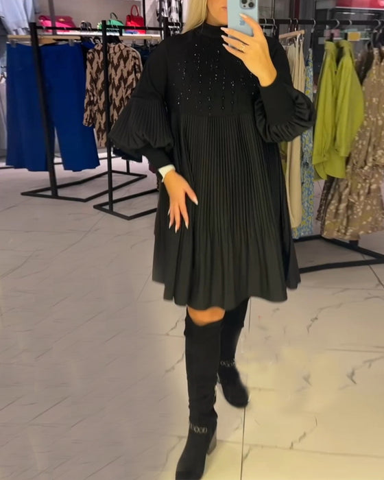 Kjole med svaj og ballonærmer