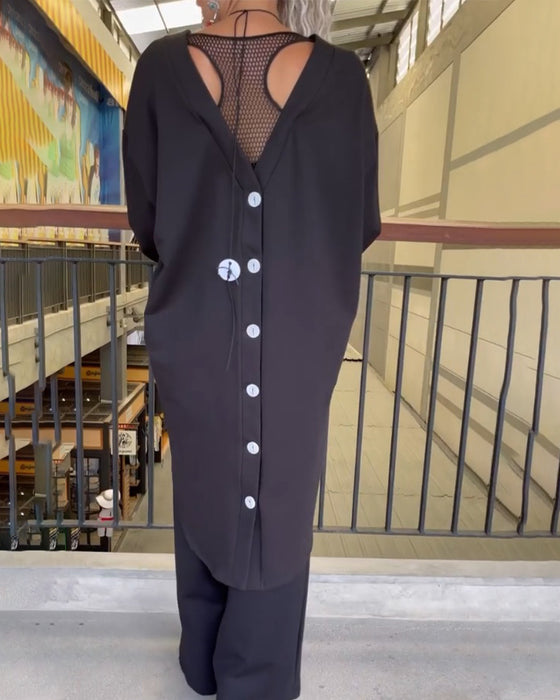 Lang top med knappelukning bagtil