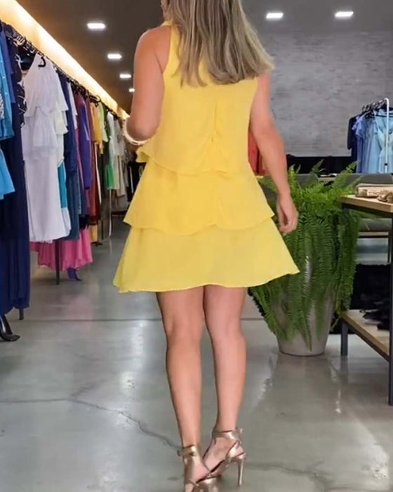 Lagdelt flæsekjole uden ærmer