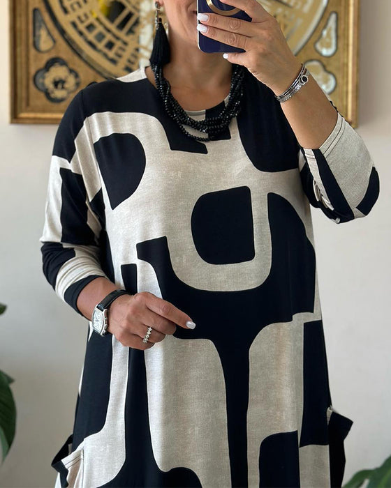 Kjole med lange ærmer og print