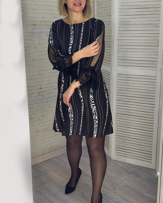 Stribet knælang kjole