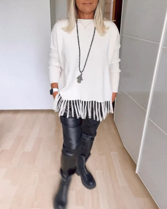 Ensfarvet afslappet sweater med frynser