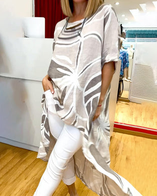 Top med løs, uregelmæssig pasform