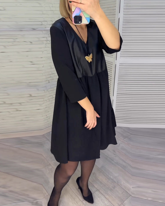 Patchwork kjole med V-hals