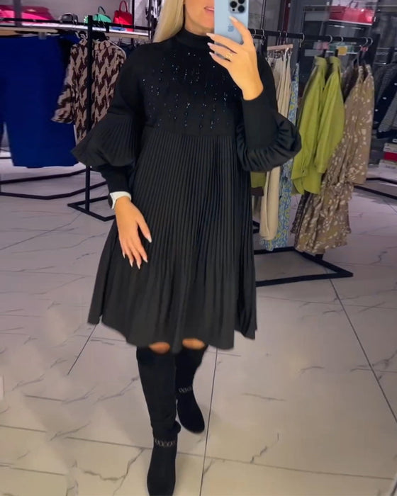 Kjole med svaj og ballonærmer