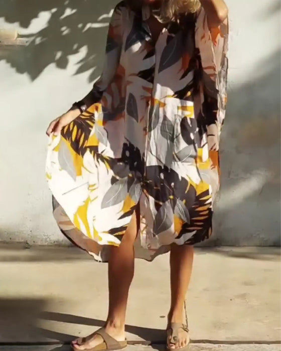 Kjole med lommer og bladprint