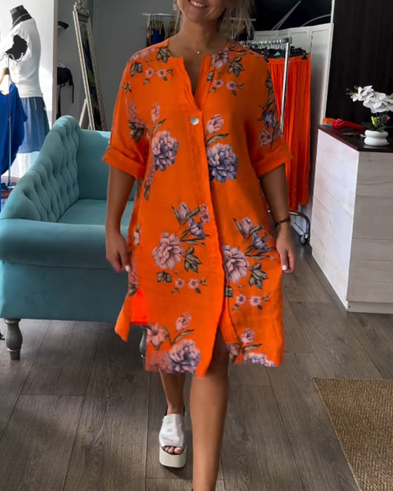 Orange kjole med knapper og print